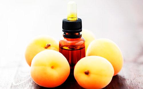 Persikkaöljy ja persikat
