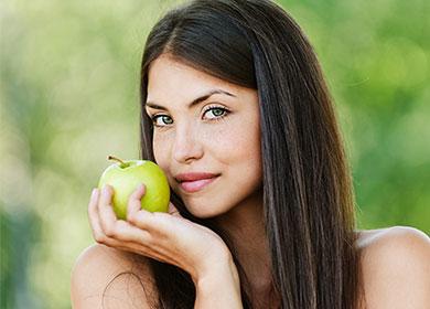 Mergaitė su obuoliu