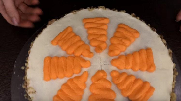 Wir machen 8 Karotten aus einer Orangencreme.