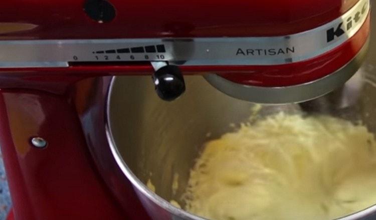 Beat butter with mixer.