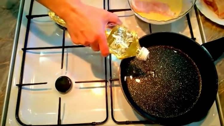 Zum Kochen von Fisch im Teig. Öl erhitzen