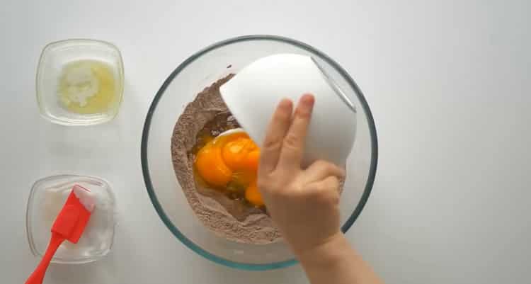 Um einen Cupcake mit einer Kirsche zuzubereiten, bereiten Sie die Zutaten vor