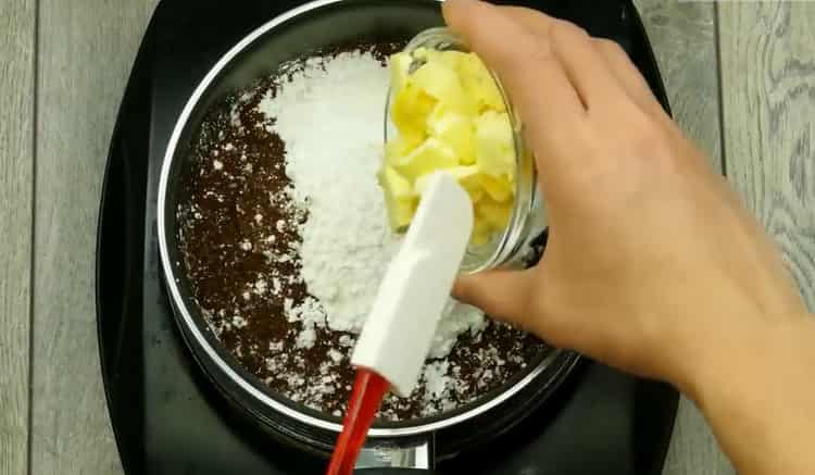 За да направите шоколадов мъфин във фурната, според рецептата, пригответе маслото