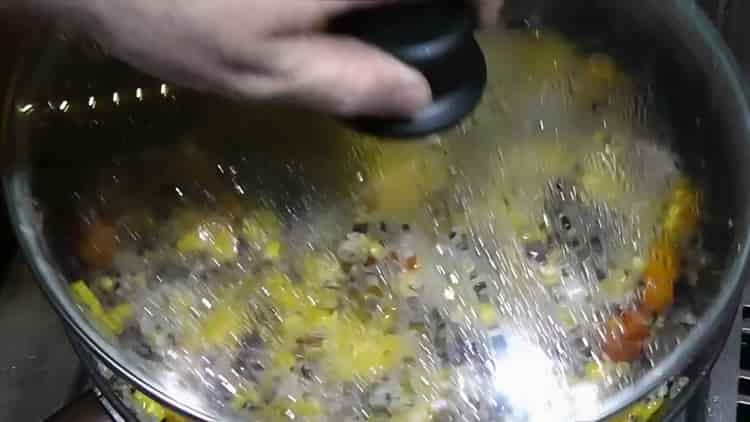 Schließen Sie den Deckel, um Reis mit Bohnen zu kochen