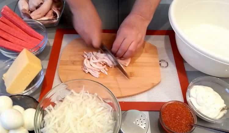 Για το μαγείρεμα, κόψτε τα καλαμάρια