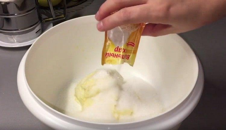 Do másla přidejte cukr a vanilkový cukr.